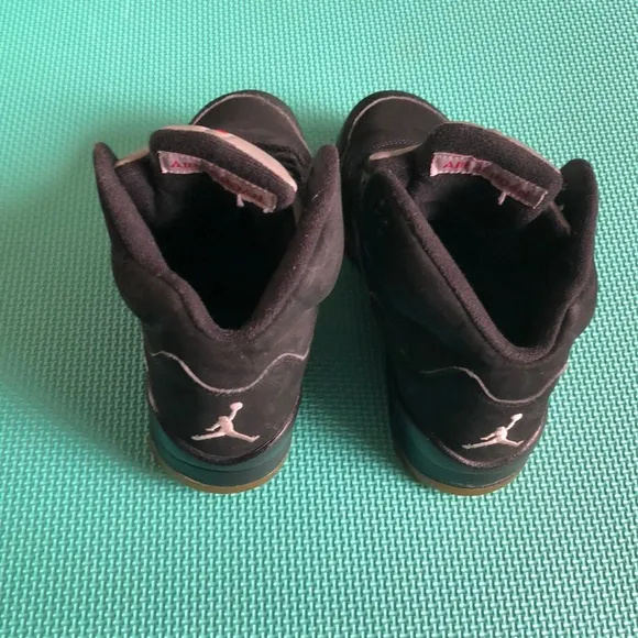 Air Jordan Kids Black and Gold Sneakers with Red Logo