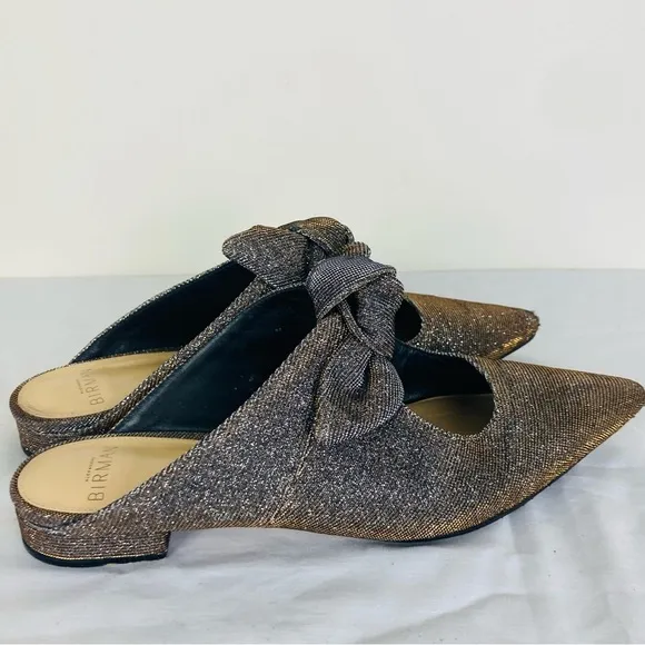 Alexandre Birman metallic pointed toe mules with bow detail. Size 35 (US 5)