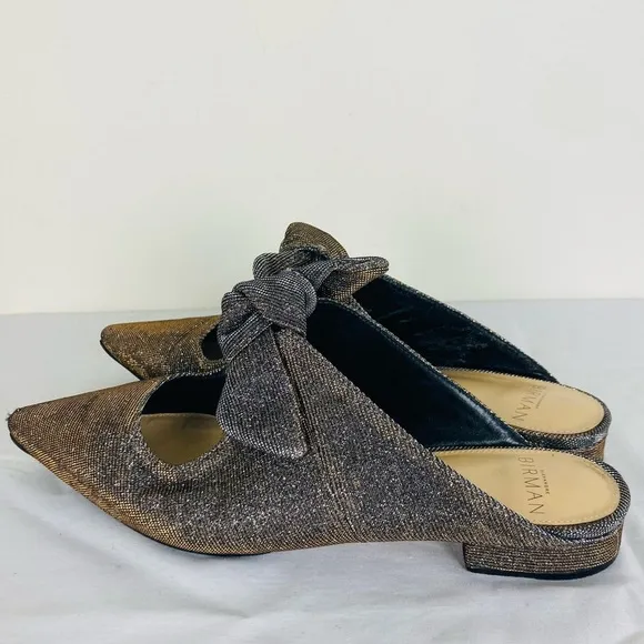 Alexandre Birman metallic pointed toe mules with bow detail. Size 35 (US 5)