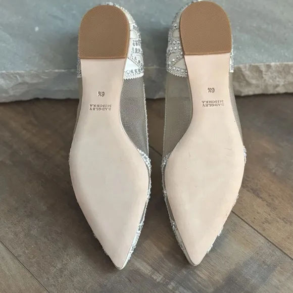 Badgley Mischka Cream Flats with Intricate Cutout Details