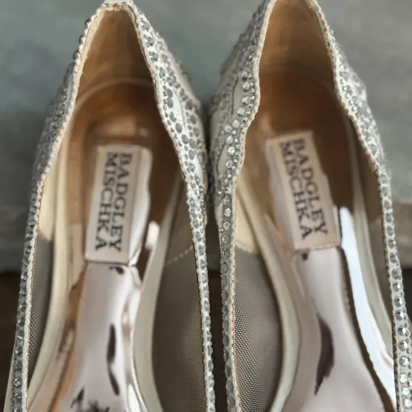 Badgley Mischka Cream Flats with Intricate Cutout Details
