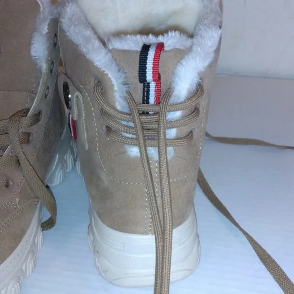Bikk embebgs fur ankle boots adjusting straps in the back lightly worn size 8