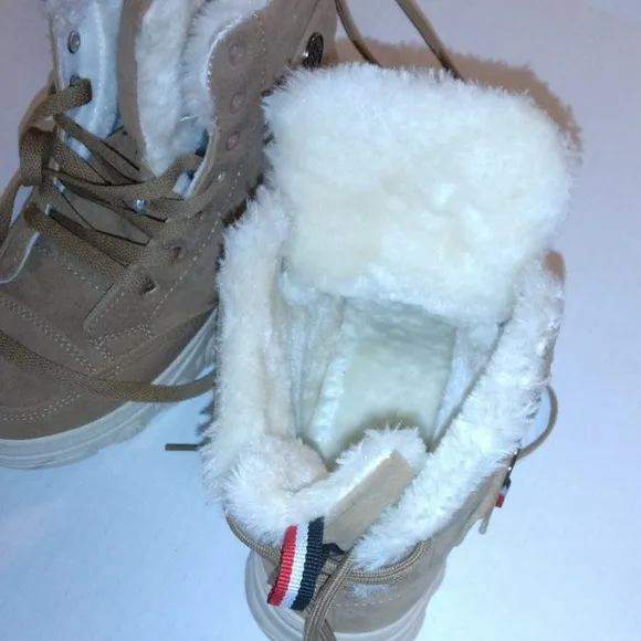 Bikk embebgs fur ankle boots adjusting straps in the back lightly worn size 8