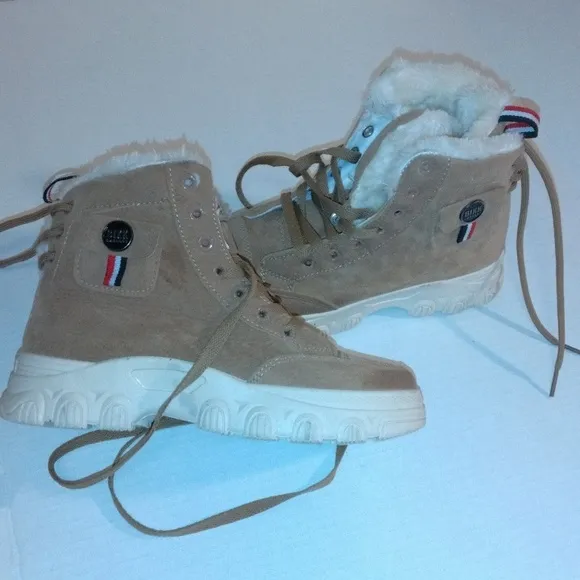 Bikk embebgs fur ankle boots adjusting straps in the back lightly worn size 8
