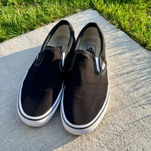 Black Canvas Slip-On Vans