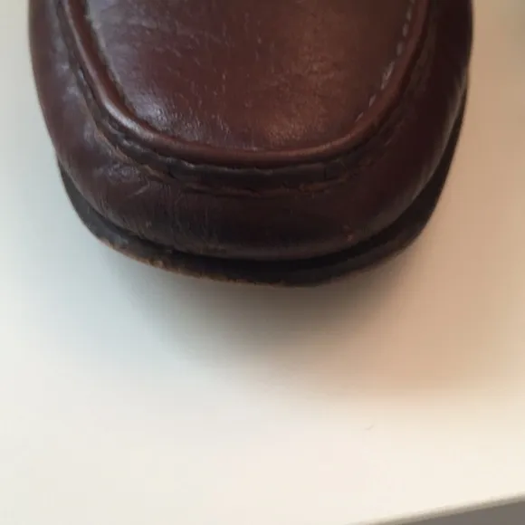 Bruno Magli brown tassel leather loafers.