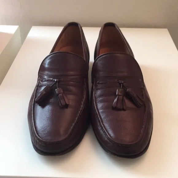 Bruno Magli brown tassel leather loafers.