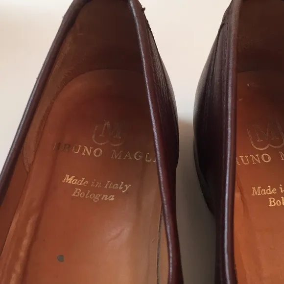 Bruno Magli brown tassel leather loafers.