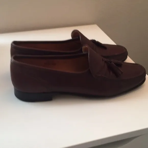 Bruno Magli brown tassel leather loafers.