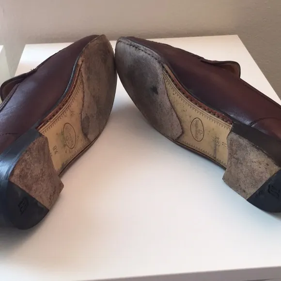 Bruno Magli brown tassel leather loafers.