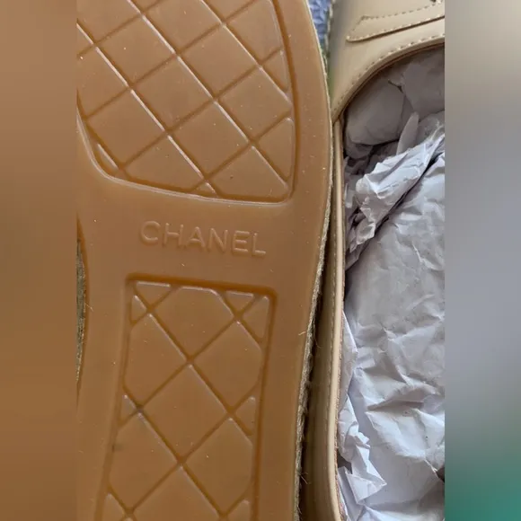 CHANEL Cream and Black Loafers with Elegant Cap Toe