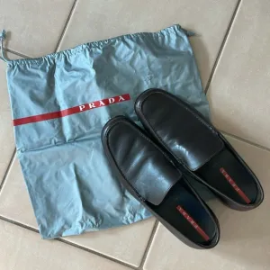Dark brown Prada Sport loafers