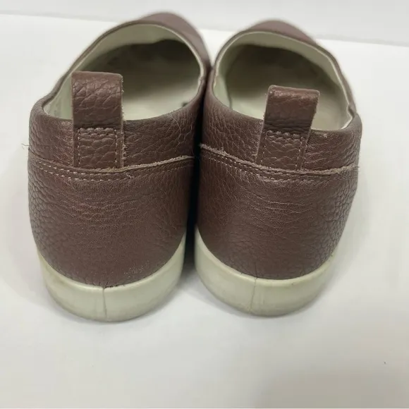Ecco Gillian slip on leather sneakers.