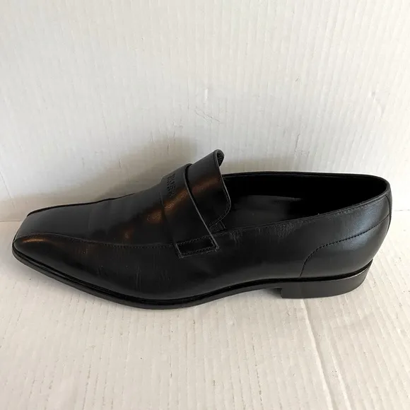 Hugo Boss -Black slip on leather loafers in good condition.Size 10.5