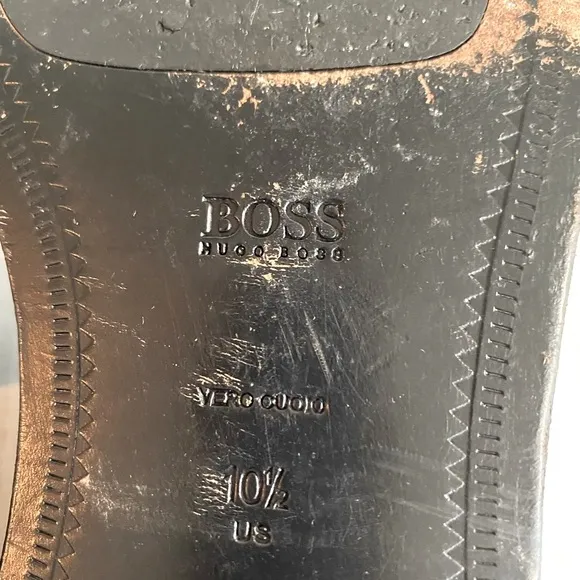 Hugo Boss -Black slip on leather loafers in good condition.Size 10.5
