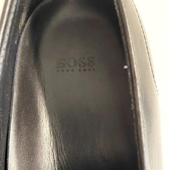 Hugo Boss -Black slip on leather loafers in good condition.Size 10.5