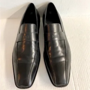 Hugo Boss -Black slip on leather loafers in good condition.Size 10.5
