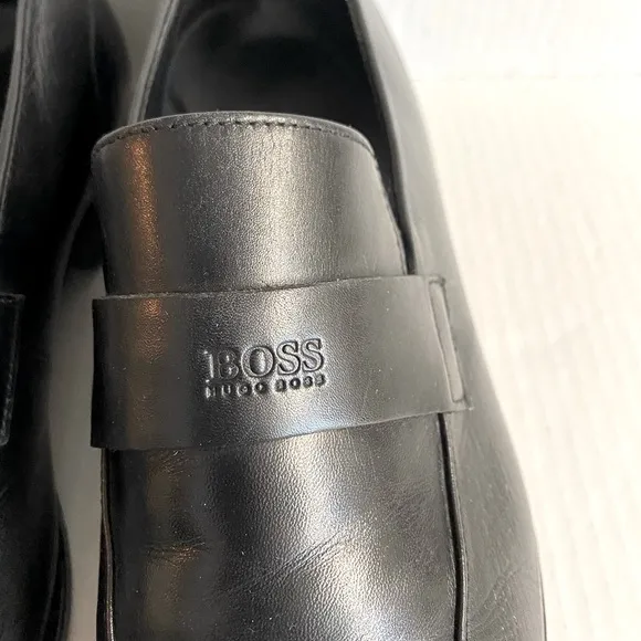 Hugo Boss -Black slip on leather loafers in good condition.Size 10.5