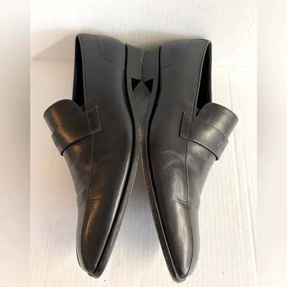 Hugo Boss -Black slip on leather loafers in good condition.Size 10.5