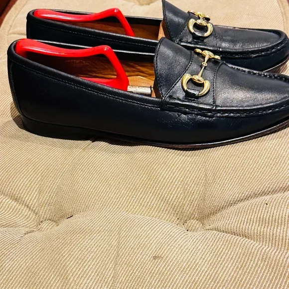 Jay Butler’s Horse Bit Black Leather Loafers with Gold Buckle.
