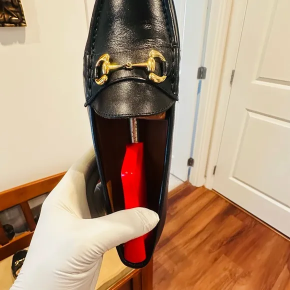 Jay Butler’s Horse Bit Black Leather Loafers with Gold Buckle.