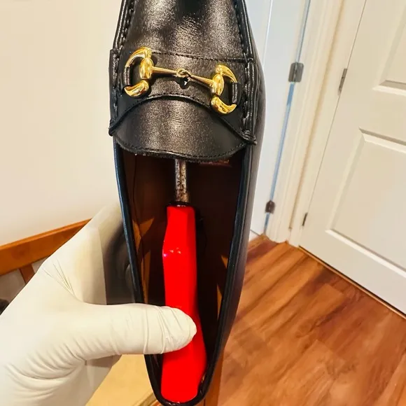 Jay Butler’s Horse Bit Black Leather Loafers with Gold Buckle.