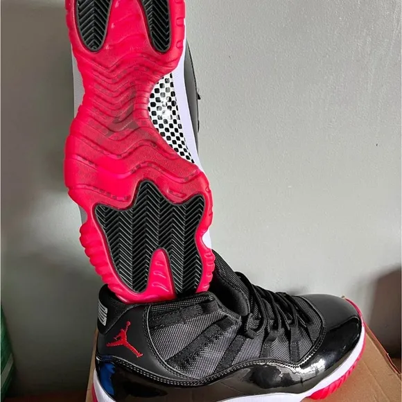 Jordan 11 Black and Red Sneakers