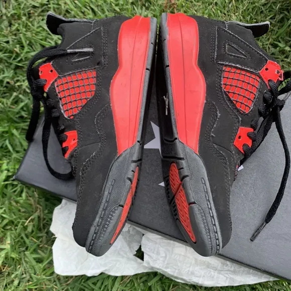 Jordan 4 Black and Red Sneakers with Mesh Panels