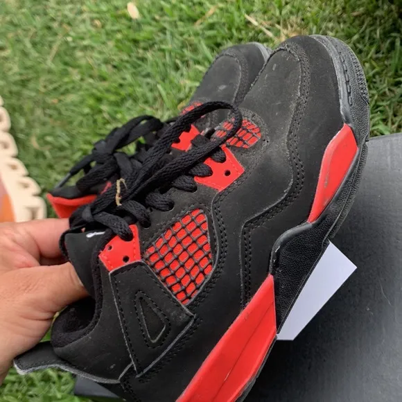 Jordan 4 Black and Red Sneakers with Mesh Panels