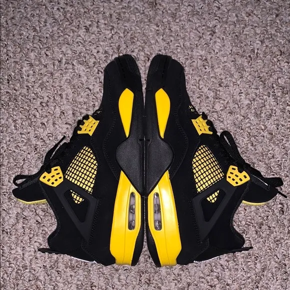 Jordan 4 Black/Yellow Thunder Sneakers
