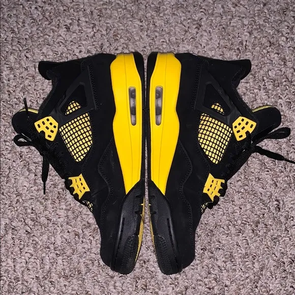 Jordan 4 Black/Yellow Thunder Sneakers