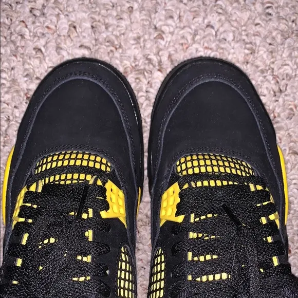 Jordan 4 Black/Yellow Thunder Sneakers