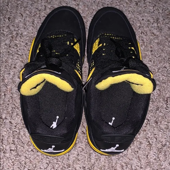Jordan 4 Black/Yellow Thunder Sneakers