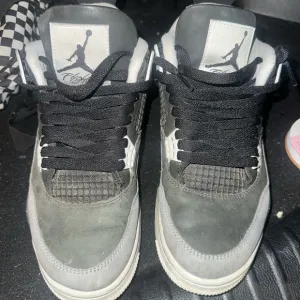 Jordan Black and Gray Air 4 Sneakers