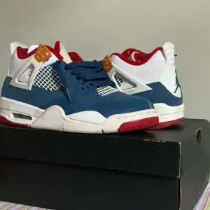 Jordan Blue and Red Sneakers with Retro Design