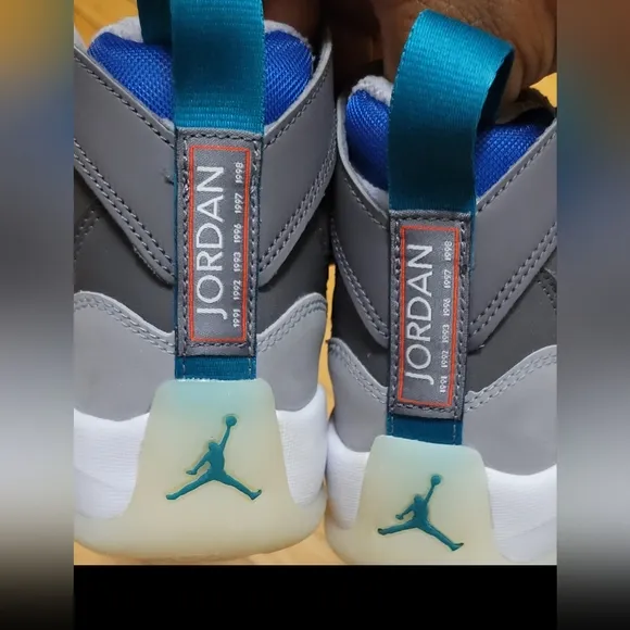 Jordan Gray and Blue Sneakers Modern Silhouette