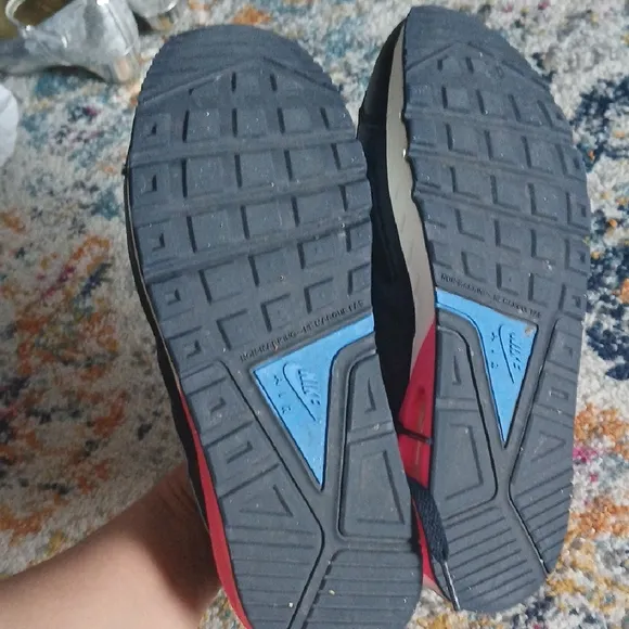 Nike Black and Blue Sneakers with Air Max Cushioning