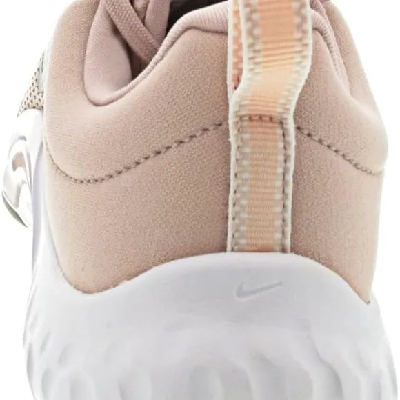 Nike Pink Sneakers with Breathable Mesh and Sleek Design