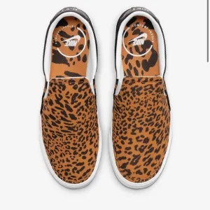 Nike women’s slip on sneakers size 9 leopard print