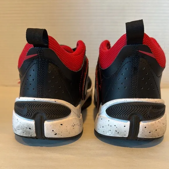 Nike youth leather and mesh Black and Red Sneakers. Size Y6