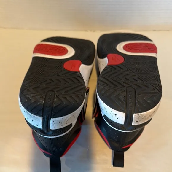Nike youth leather and mesh Black and Red Sneakers. Size Y6