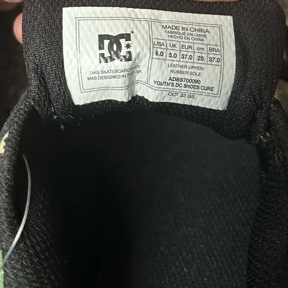 NWOT DC Black and Camo Sneakers