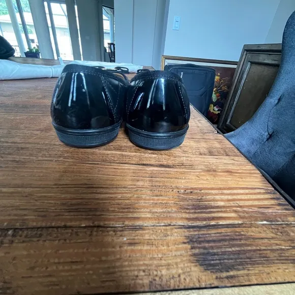 Salvatore Ferragamo Black Flats with Gold Accent