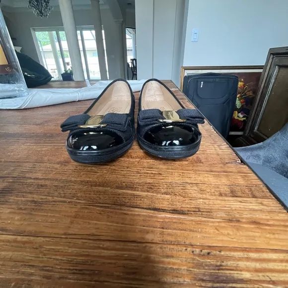 Salvatore Ferragamo Black Flats with Gold Accent
