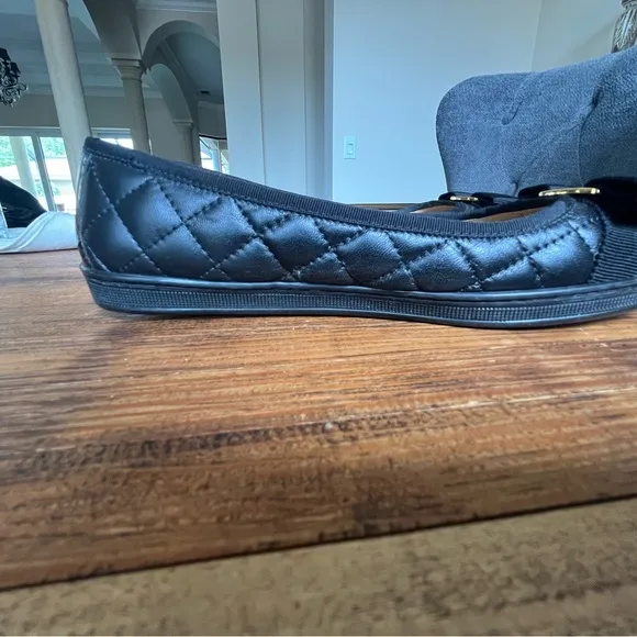 Salvatore Ferragamo Black Flats with Gold Accent