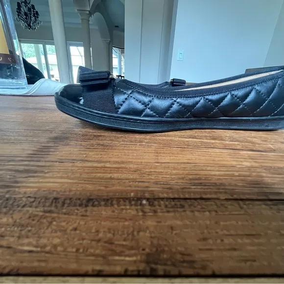 Salvatore Ferragamo Black Flats with Gold Accent