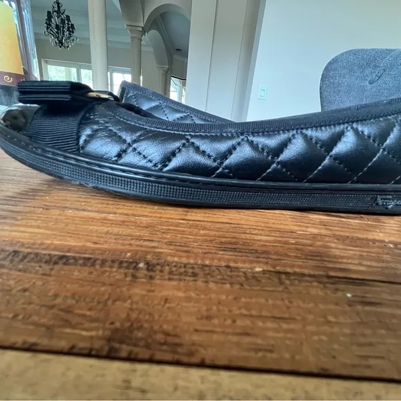 Salvatore Ferragamo Black Flats with Gold Accent