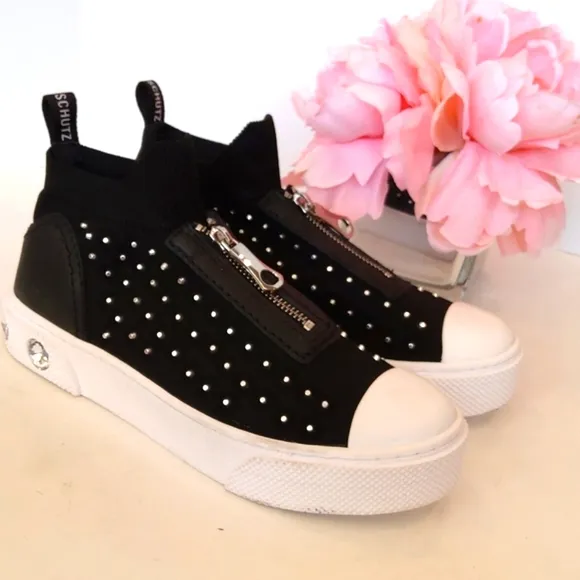 Schutz Black zip front studded slip on sneakers