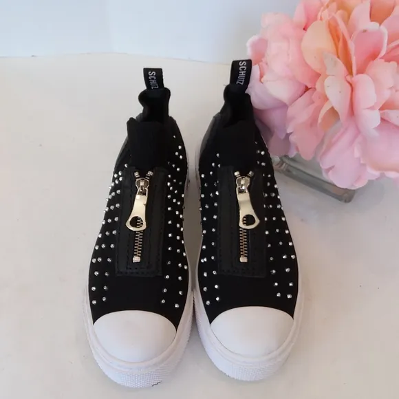 Schutz Black zip front studded slip on sneakers