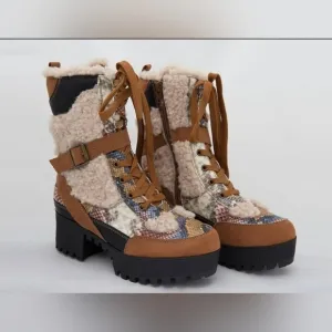 SNAKESKIN print with brown trim, sherpa lined interior, platform boot